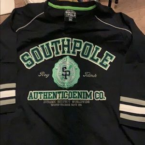 Big men’s shirt. Looks like 3/4 sleeve maybe